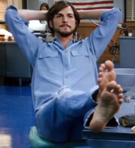 Ashton Kutcher soles desk